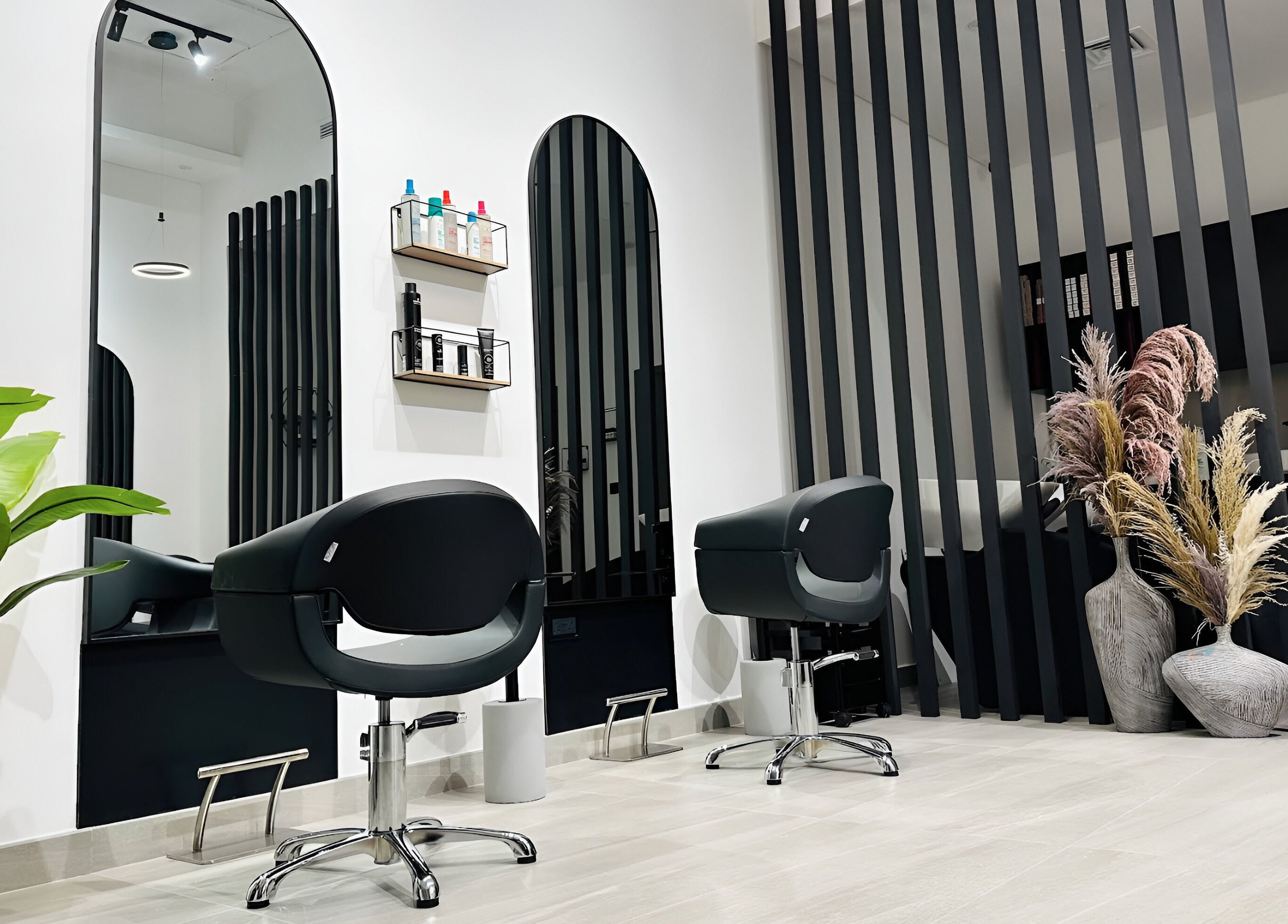 Chic interior of Always On Show Hair Studio in Dubai, قرية جميرا الدائرية, AE featuring modern styling chairs.