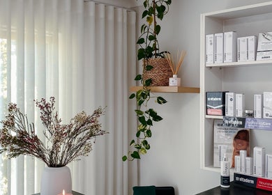 Spatique's elegant product display in Cape Town, Western Cape, ZA, featuring skincare items and decor.
