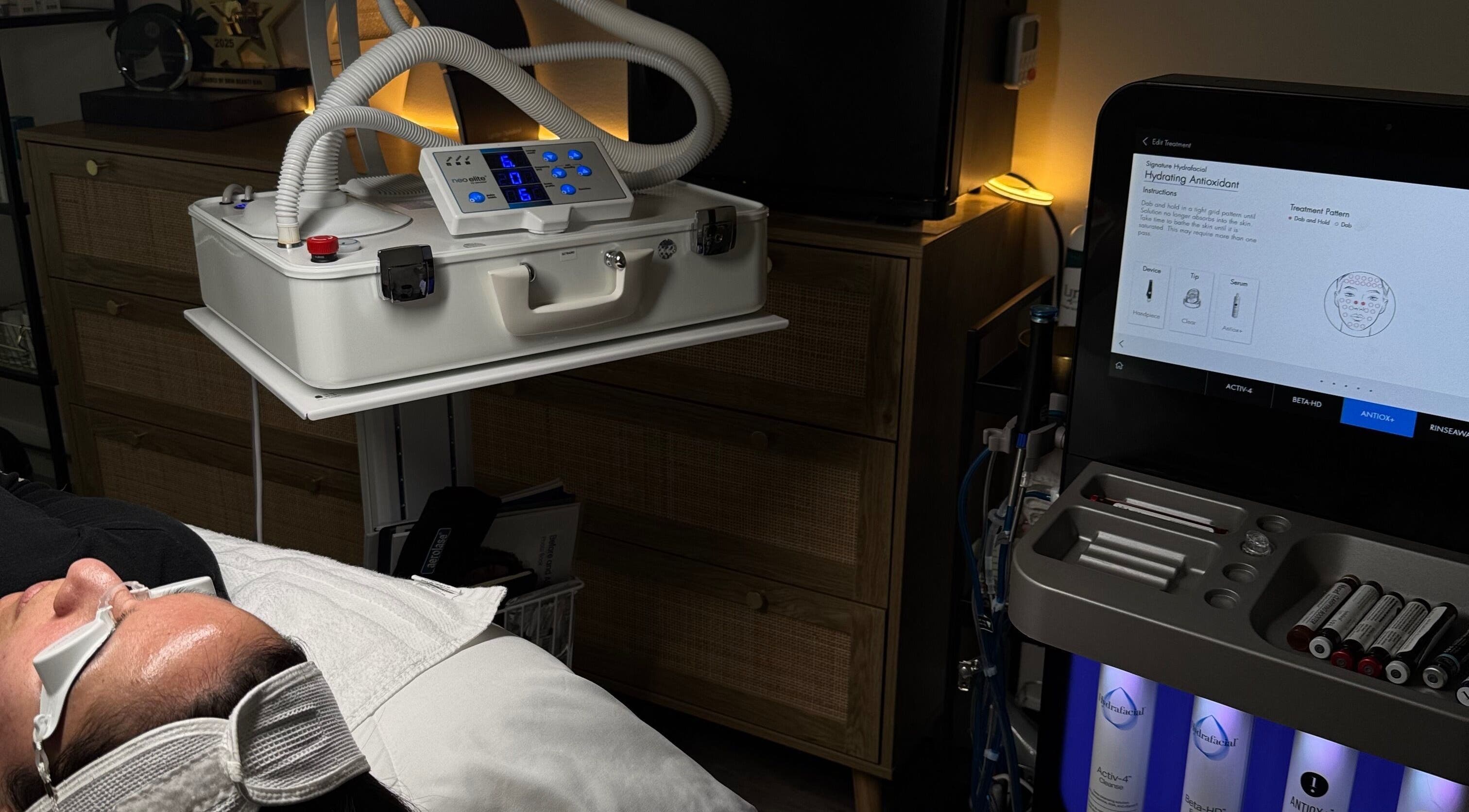 Facial treatment at Shades of Skin Beauty Bar, Vaughan, Ontario, CA, featuring advanced skincare technology.