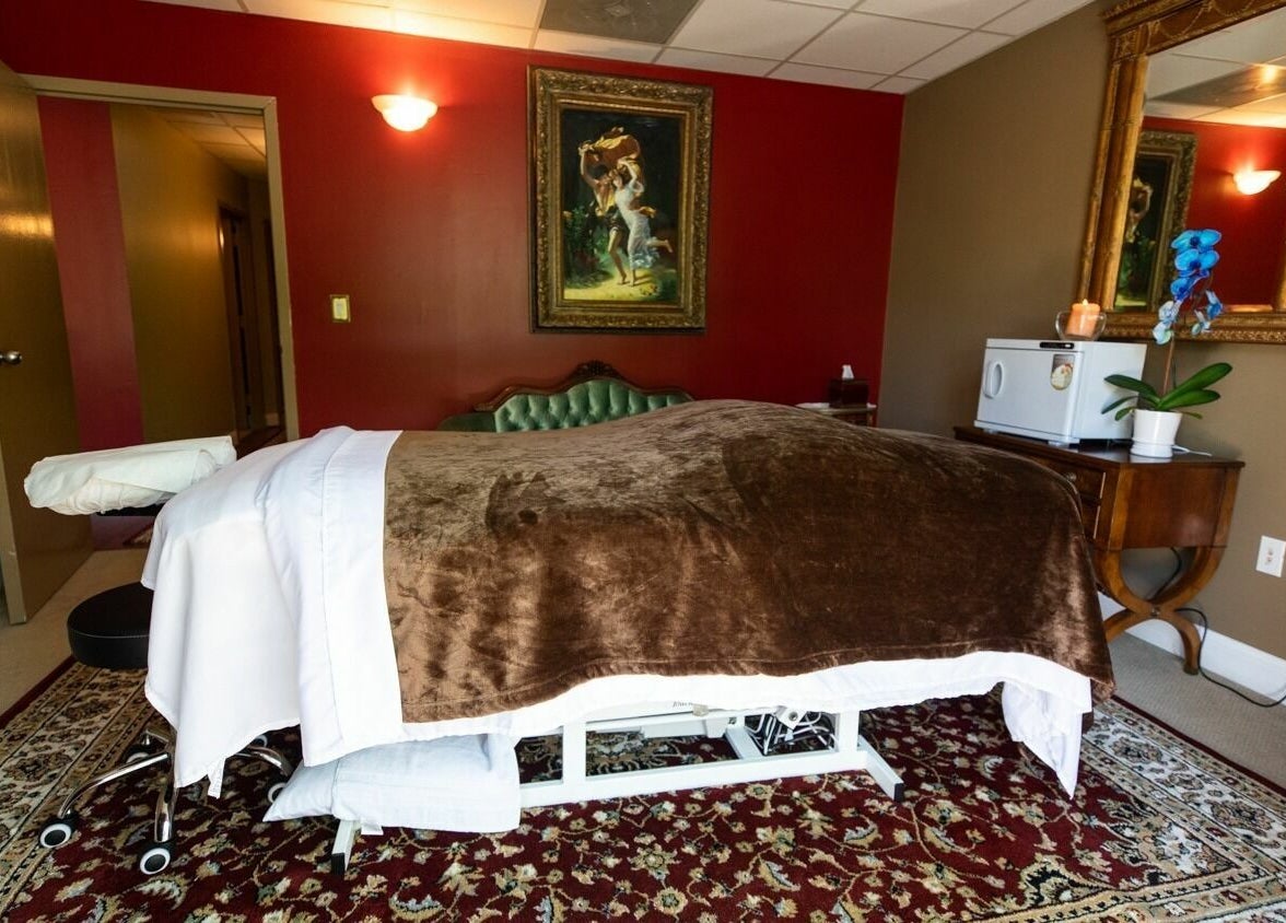 Massage room with elegant decor at SYL Spa in North Bethesda, Maryland, US for ultimate relaxation.