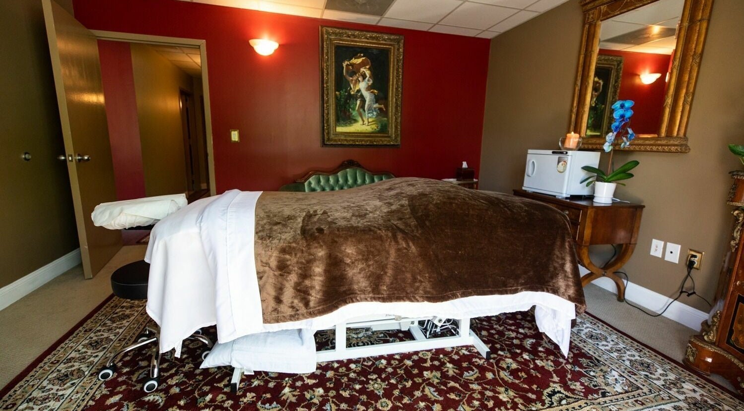 Massage room with elegant decor at SYL Spa in North Bethesda, Maryland, US for ultimate relaxation.