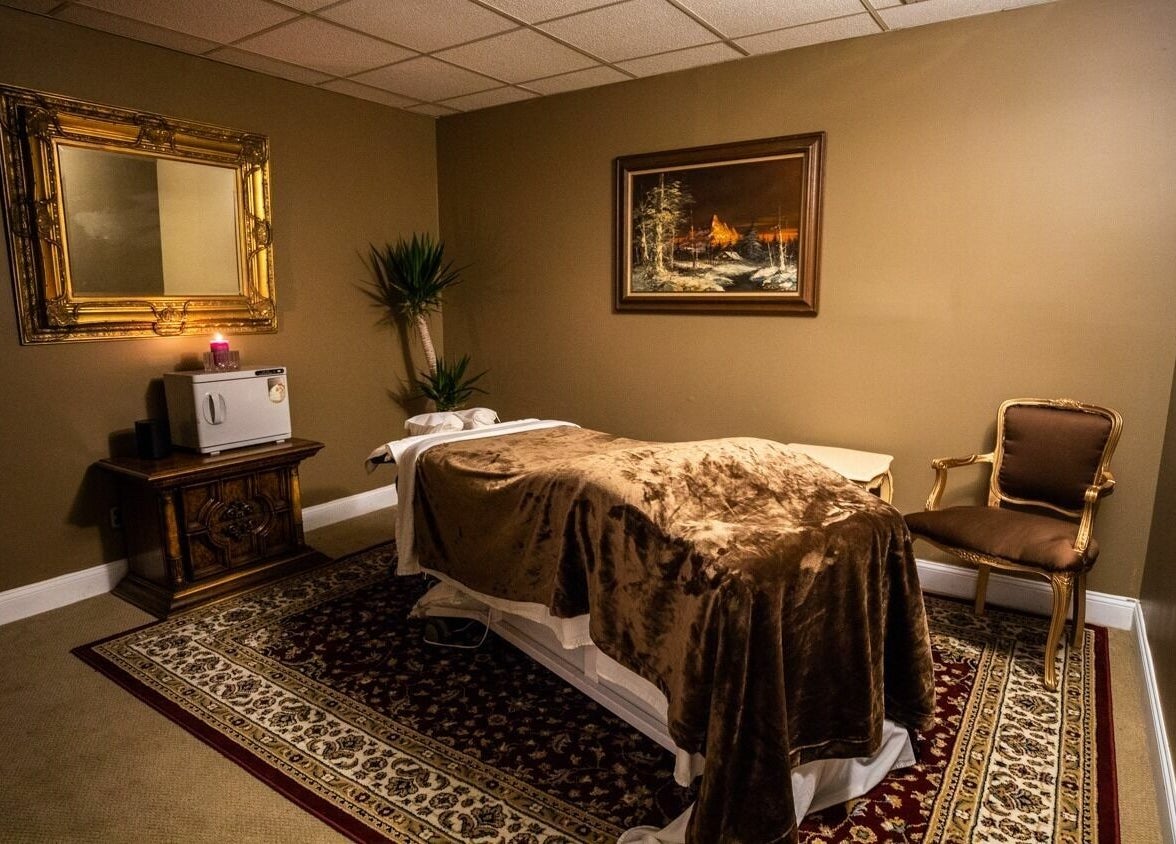 Relaxing massage room with soft lighting at SYL Spa, North Bethesda, Maryland, US, perfect for wellness.