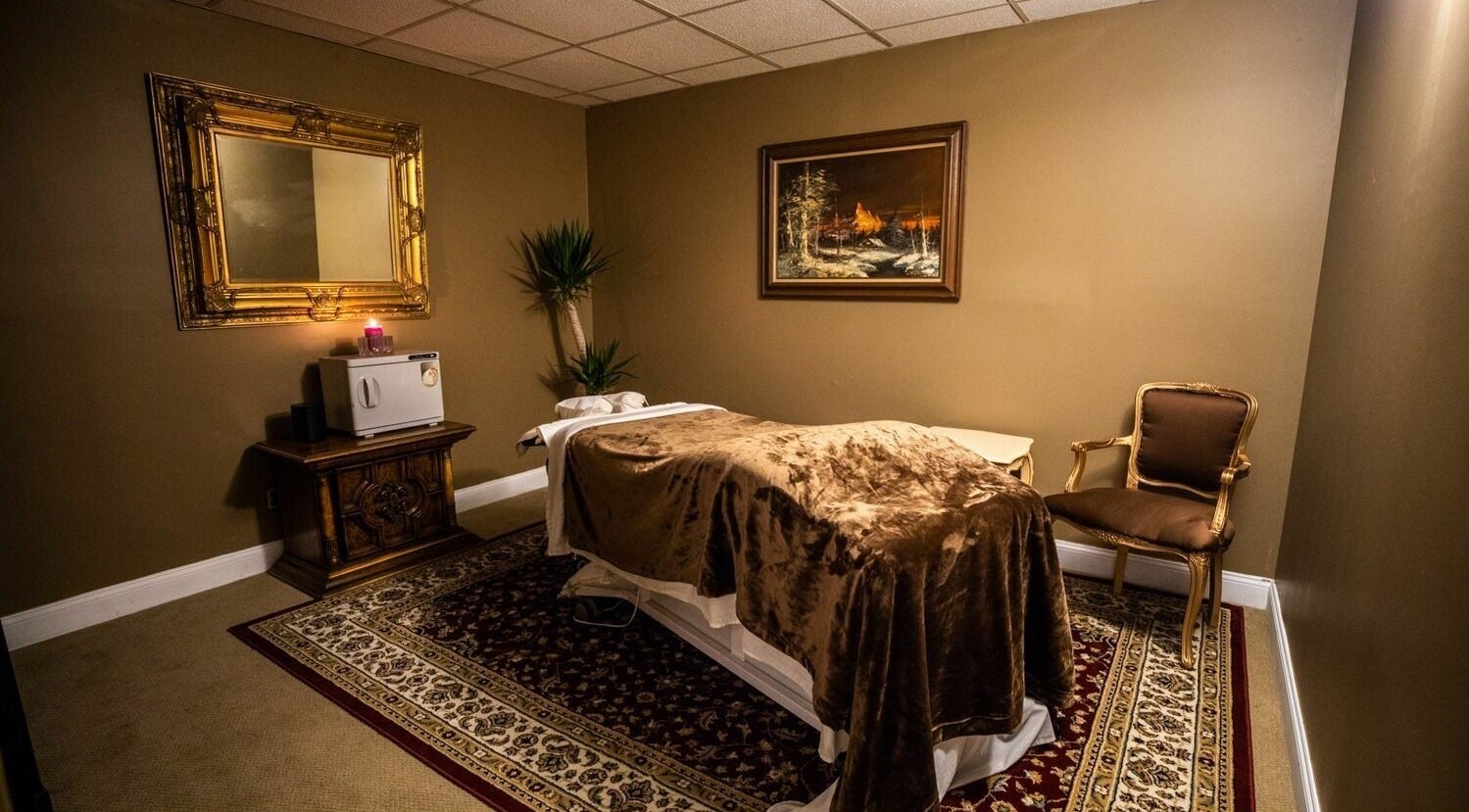 Relaxing massage room with soft lighting at SYL Spa, North Bethesda, Maryland, US, perfect for wellness.