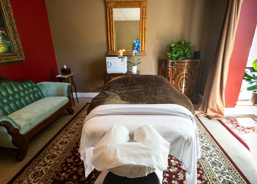 Relaxing massage room at SYL Spa, North Bethesda, Maryland, US with elegant decor and serene ambiance.
