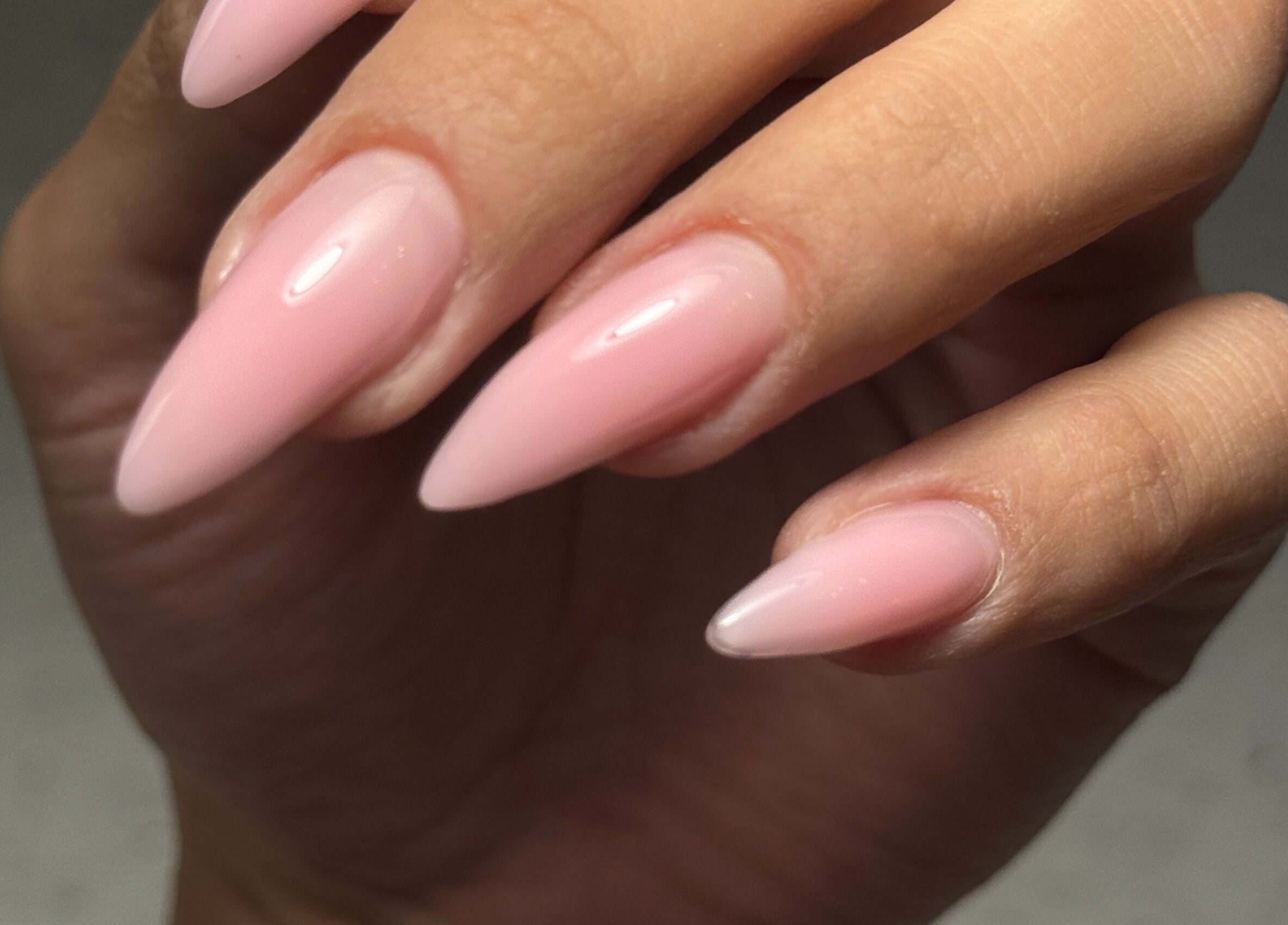 Elegant pink nails styled at Glamdolls in Dublin, County Dublin, IE showcasing perfect manicure.