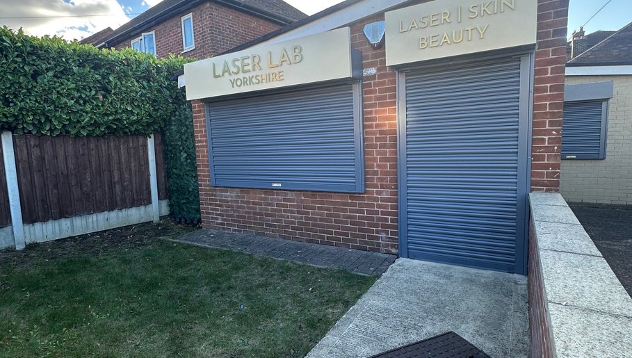 Front exterior of Laser Lab Yorkshire, beauty venue in Normanton, England, GB with closed shopfront.