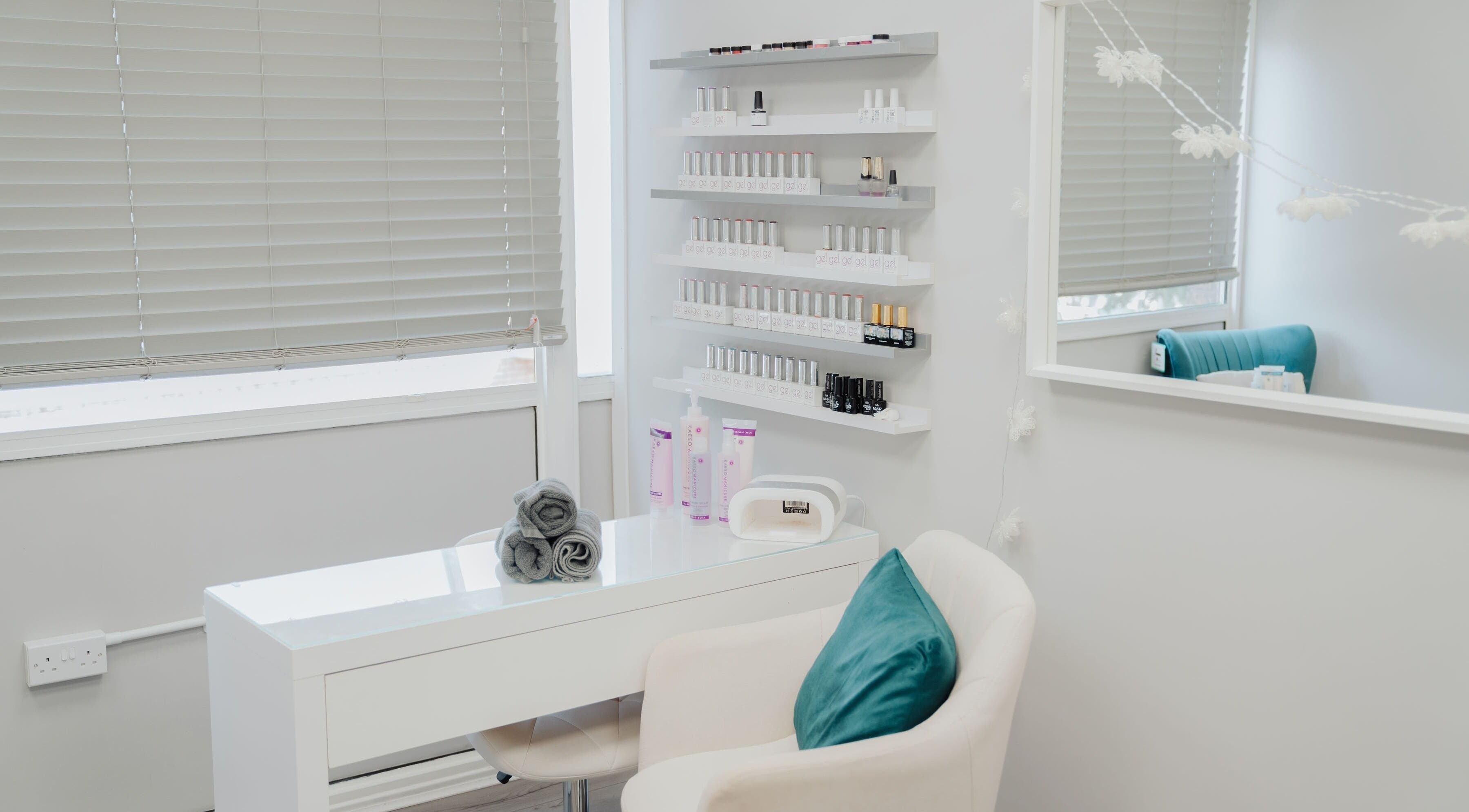 Chic nail salon setup at The Glow Haus, Kingswinford, England, GB. Modern design with nail polish display.