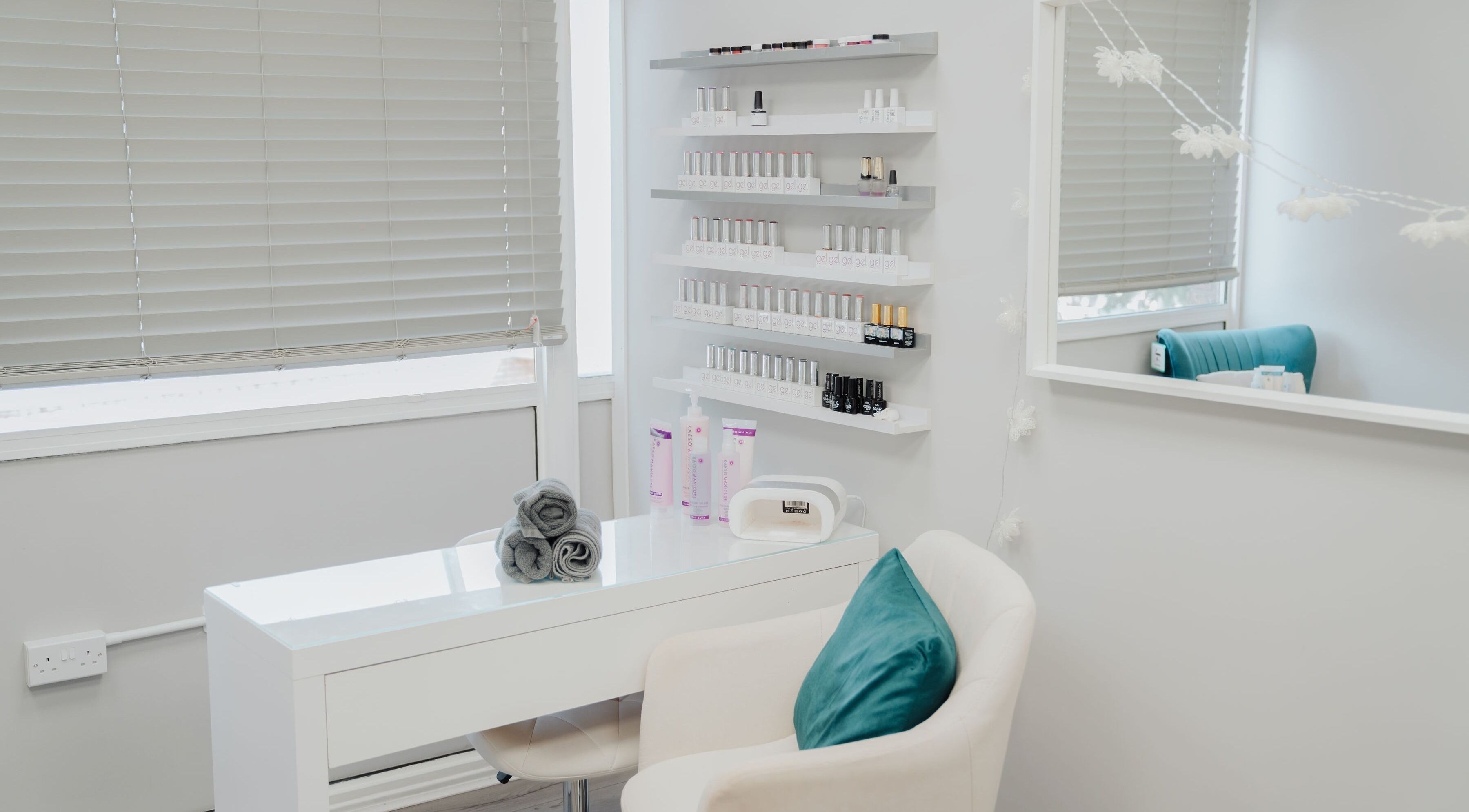 Chic nail salon setup at The Glow Haus, Kingswinford, England, GB. Modern design with nail polish display.