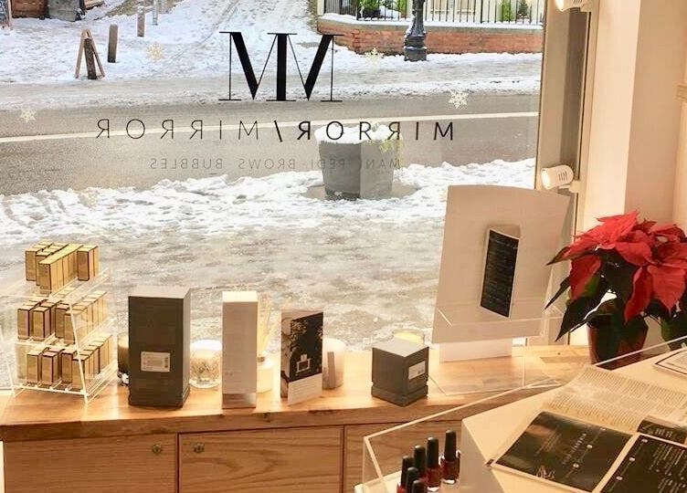 View from Mirror Mirror Shrewsbury showcasing products with snow outside in Shrewsbury, GB.