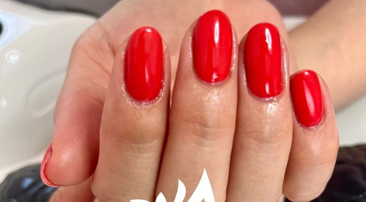Vibrant red manicure showcasing expert nail art at JP Beauty Studio, Papamoa, Bay Of Plenty, NZ.