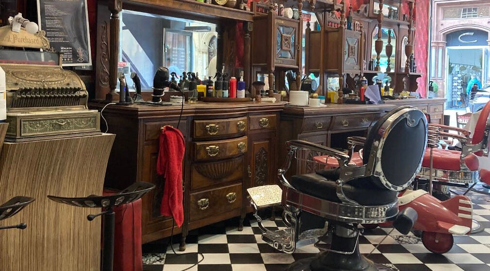 Elegant vintage barbershop interior at Brazuca B5 Barbers in Carlisle, England, GB with classic décor.