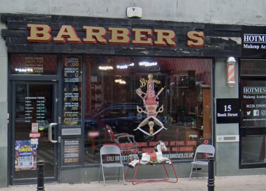Front view of Brazuca B5 Barbers in Carlisle, England, GB showing entrance and signage.