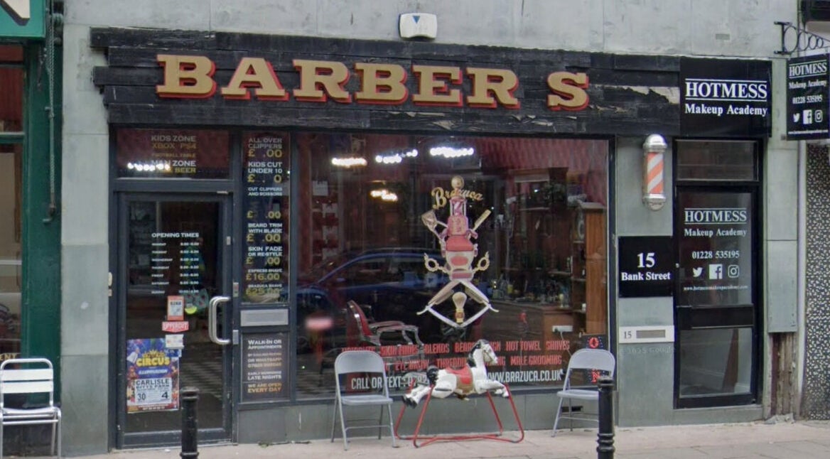 Front view of Brazuca B5 Barbers in Carlisle, England, GB showing entrance and signage.