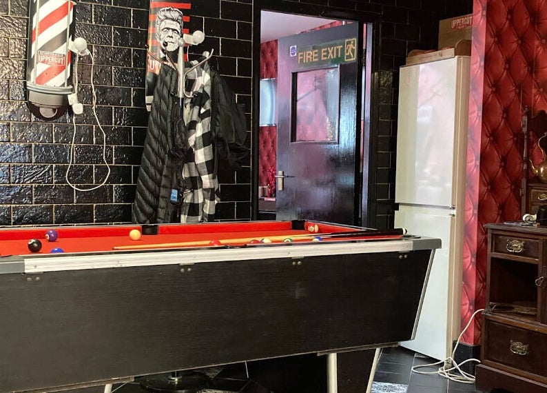 Pool table and stylish decor at Brazuca B5 Barbers, Carlisle, England, GB.