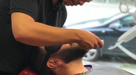 A close-up of a beard trim at Brazuca B1 Barbers, Carlisle, England, GB, showcasing precise grooming.