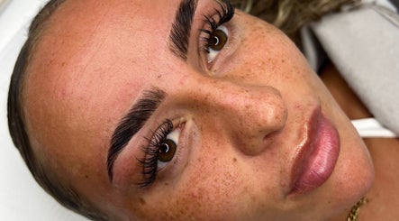 Close-up of a woman's groomed eyebrows and lashes at RH Cosmetics in Leeds, England, GB.