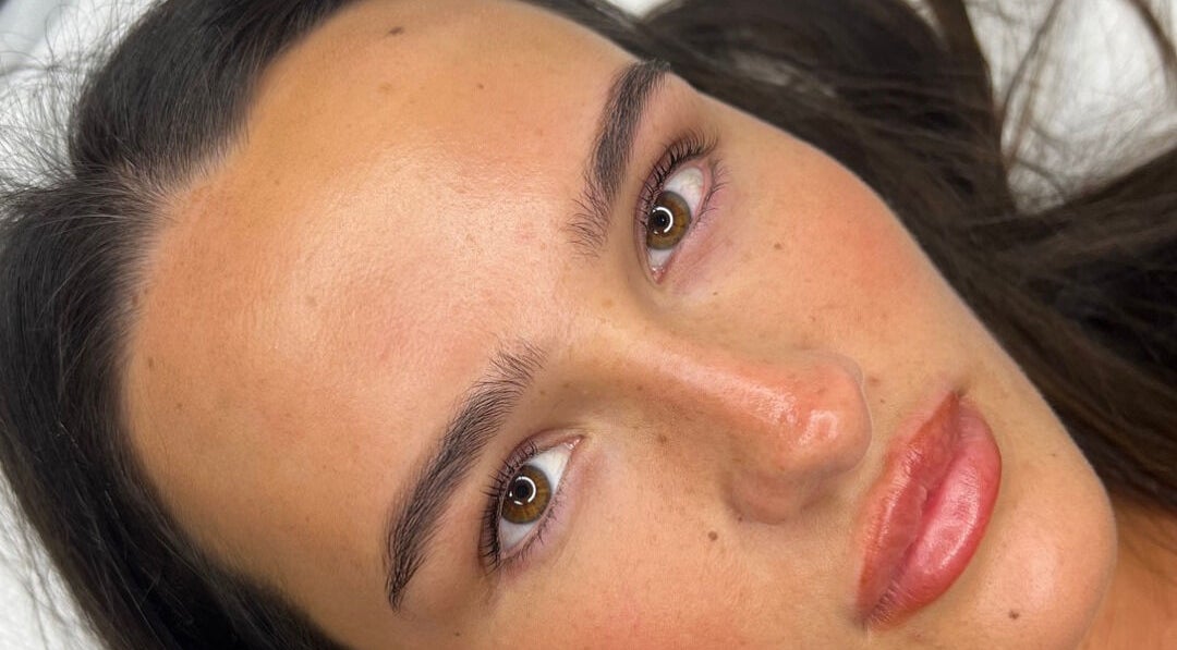 Close-up of a woman's glowing skin post-treatment at RH Cosmetics, Leeds, England, GB.