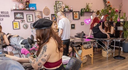 Artists tattooing at Tattoo Like a Girl Club, a vibrant studio in Dublin, County Dublin, IE.