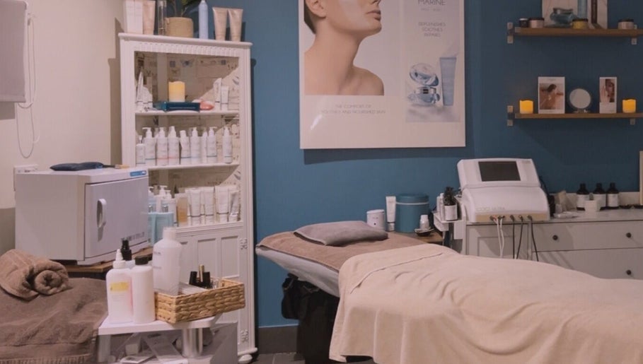 Calming skincare room at Beau Beauty And Skincare Specialist in Sutterton, England, GB with treatment bed and supplies.