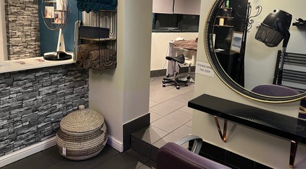 Modern salon interior at Beau Beauty And Skincare Specialist in Sutterton, England, GB, featuring seating and decor.