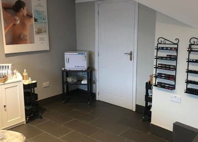 Modern treatment room at Beau Beauty And Skincare Specialist in Sutterton, England, GB with elegant decor.