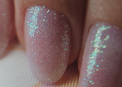 Close-up of glittery nails at JB Beauty, Cork, County Cork, IE showcasing elegant nail art.