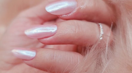Close-up of iridescent manicured nails at JB Beauty, Cork, County Cork, IE, offering a luxurious nail experience.