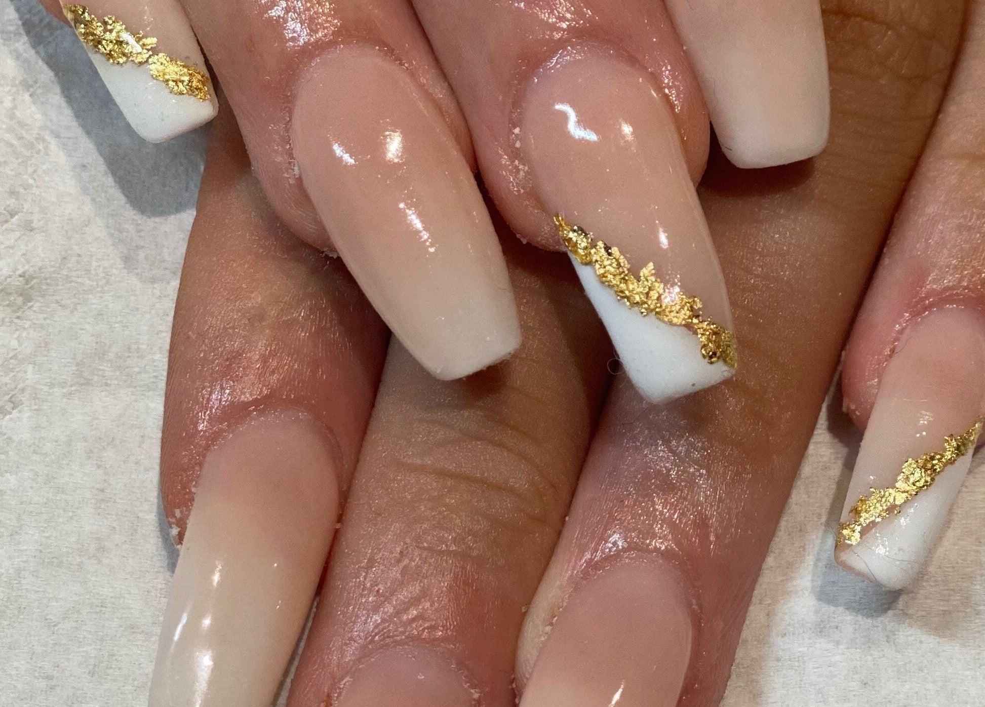 Elegant nail art with gold accents from KLR Beauty and Brows, Jarrow, England, GB.