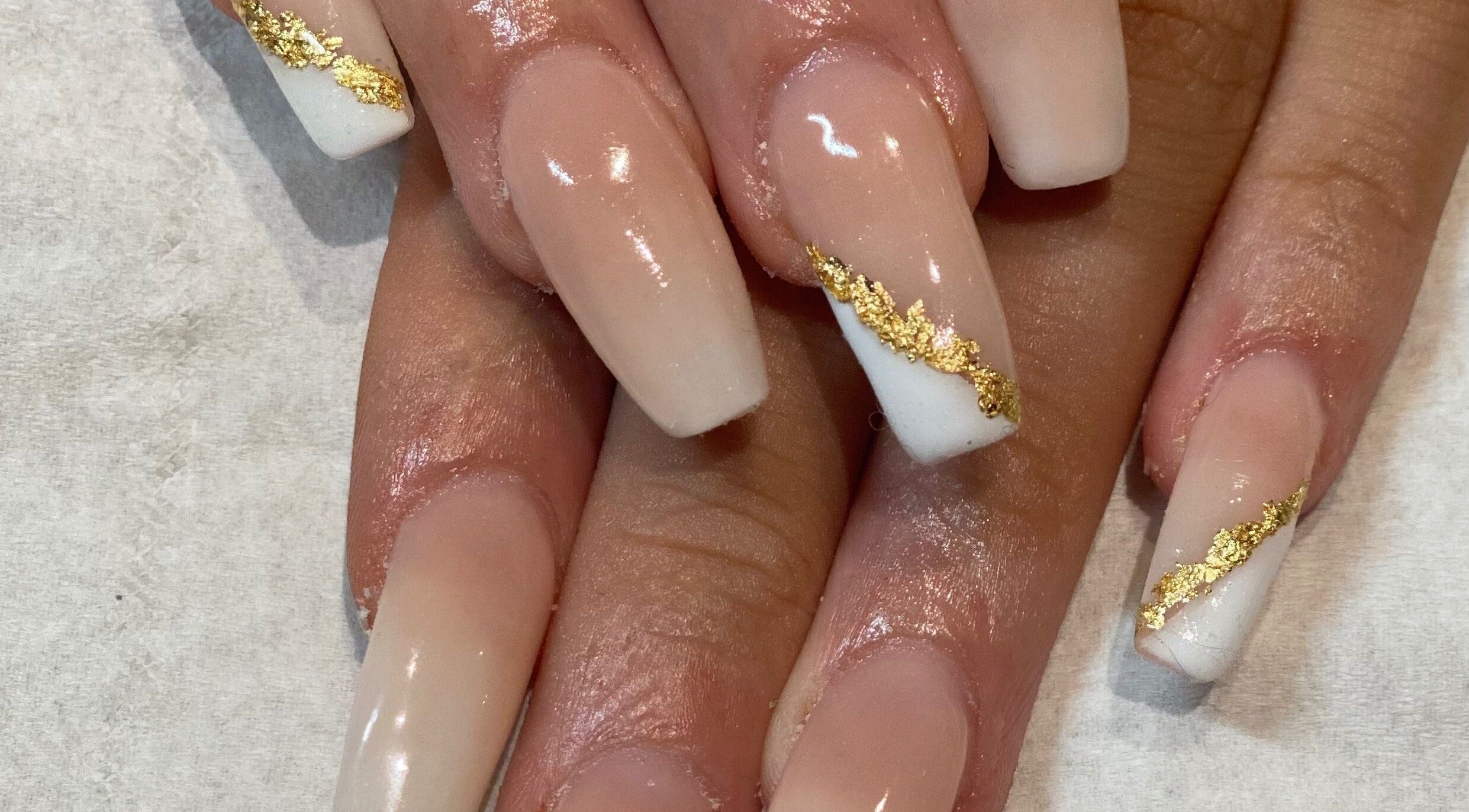 Elegant nail art with gold accents from KLR Beauty and Brows, Jarrow, England, GB.