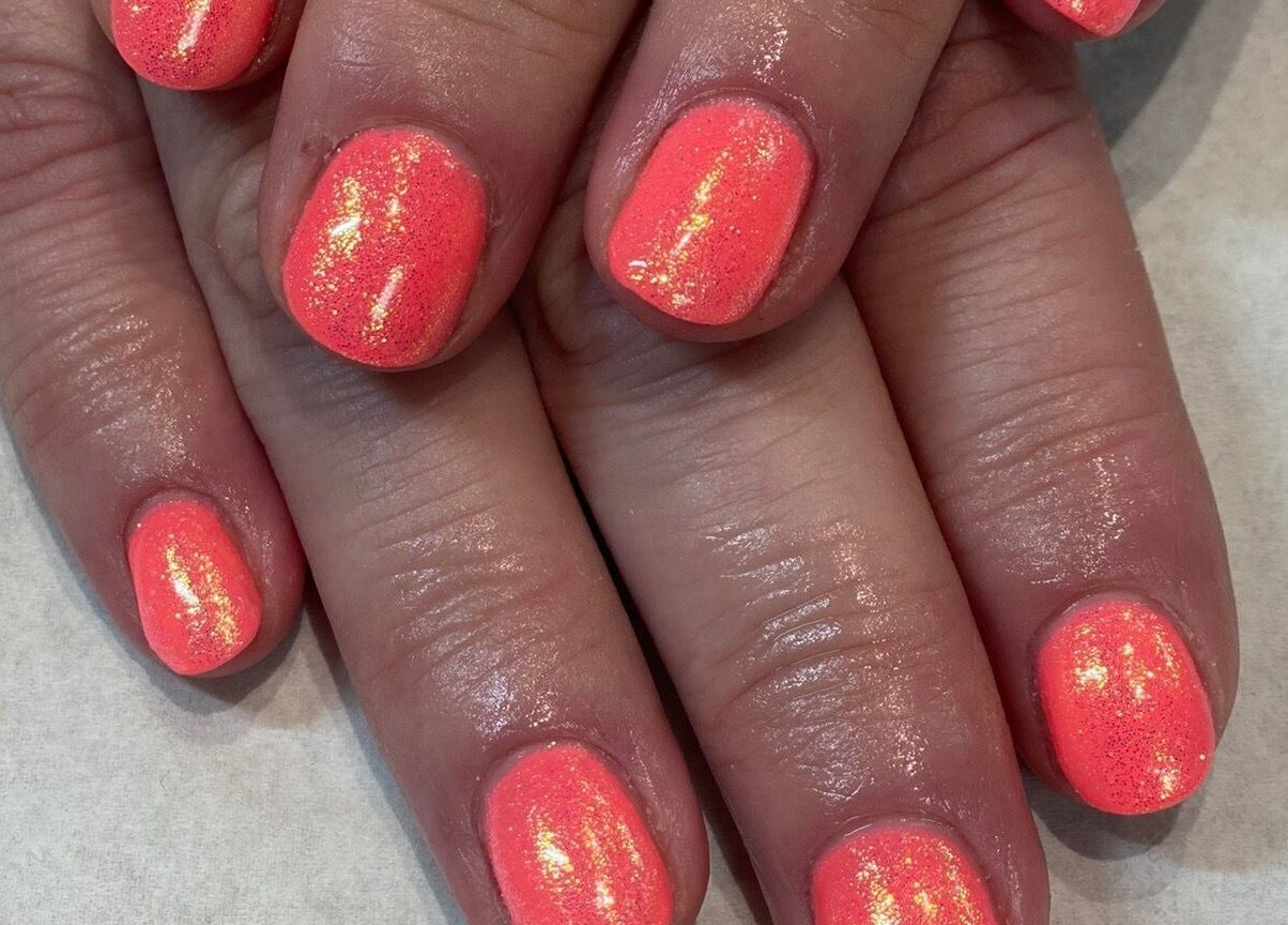 Bright coral nails with shimmer at KLR Beauty and Brows, Jarrow, England, GB.