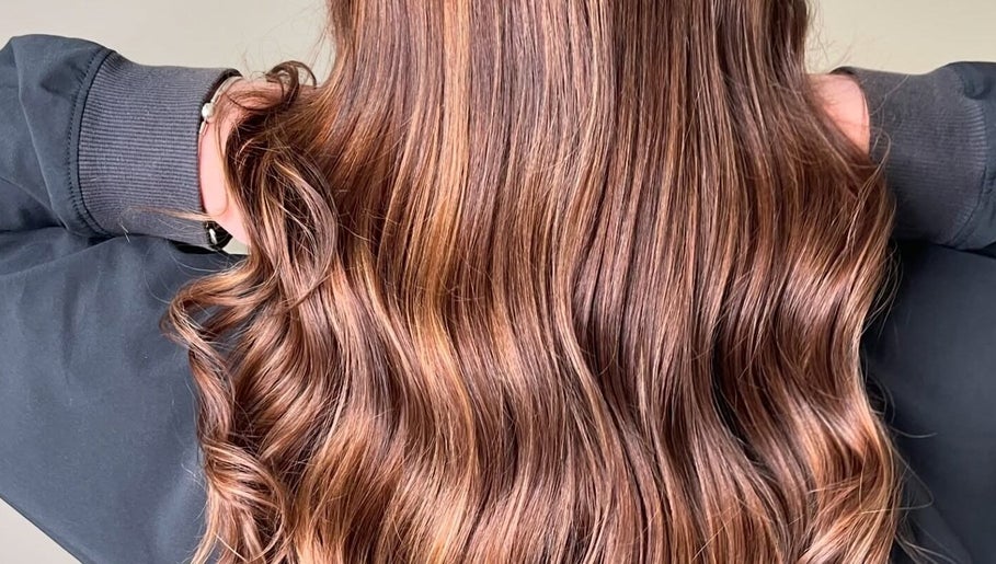Shiny, wavy brown hair professionally styled at Shekinah Studios Ltd, Manukau, Auckland, NZ.