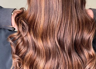 Shiny, wavy brown hair professionally styled at Shekinah Studios Ltd, Manukau, Auckland, NZ.