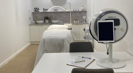 Relaxing spa treatment room at The Skin Conservatory Aldinga Beach, South Australia, AU with cozy bed and modern tools.