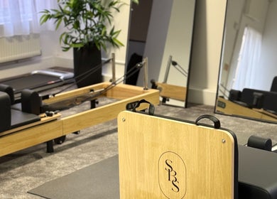 Pilates equipment at SKN By Sonia | Skin & Wellness Spa, Burton Upon Trent, England, GB. Modern, serene wellness space.