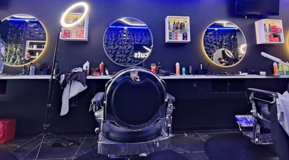 Freshcutsa Barber Shop in Woodville, South Australia, AU featuring modern styling stations and barber chairs.