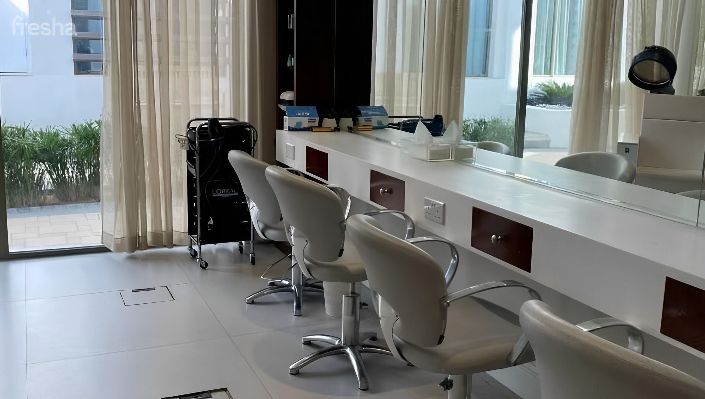 Modern salon chairs and mirrors at Zoz Lashes - Dariyah, located in Diriyah, SA, offering beauty services.
