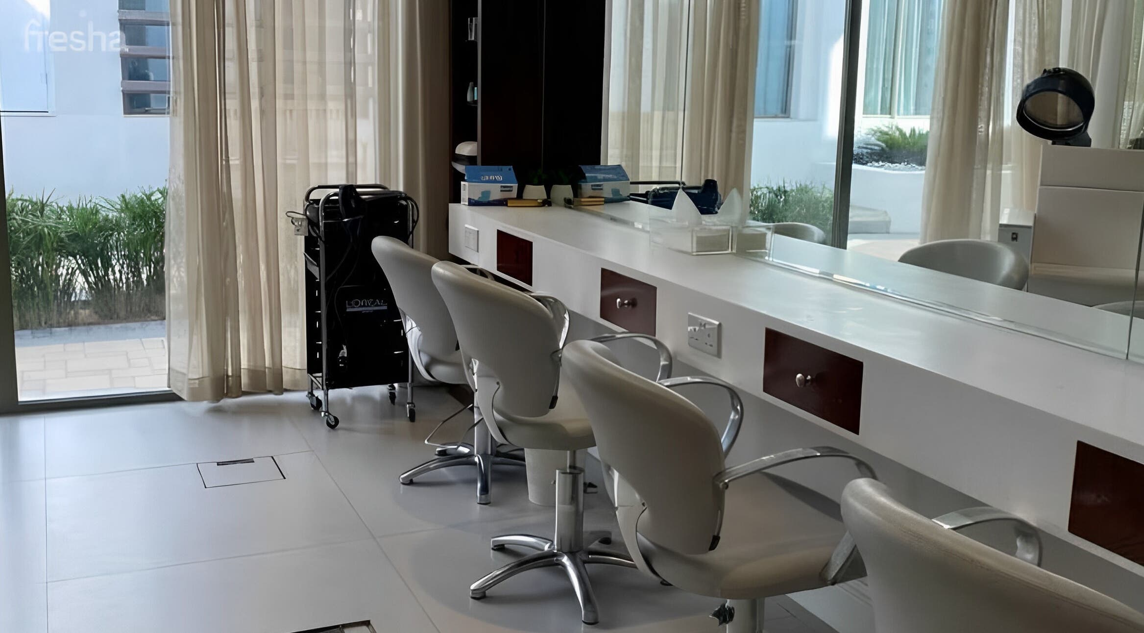 Modern salon chairs and mirrors at Zoz Lashes - Dariyah, located in Diriyah, SA, offering beauty services.