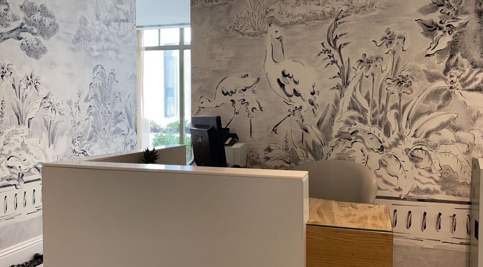 Elegant reception with artistic mural at Zoz Lashes - Dariyah, Diriyah, SA.