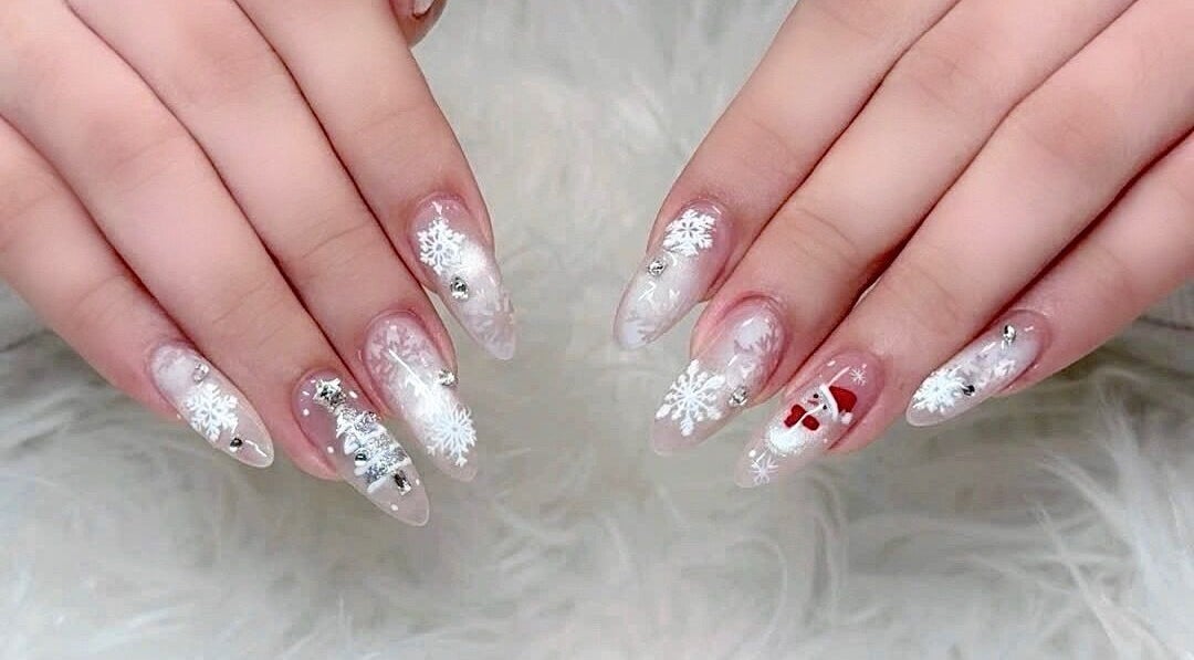 Festive snowflake nail art at Beauticure Nails, Toronto, Ontario, CA.