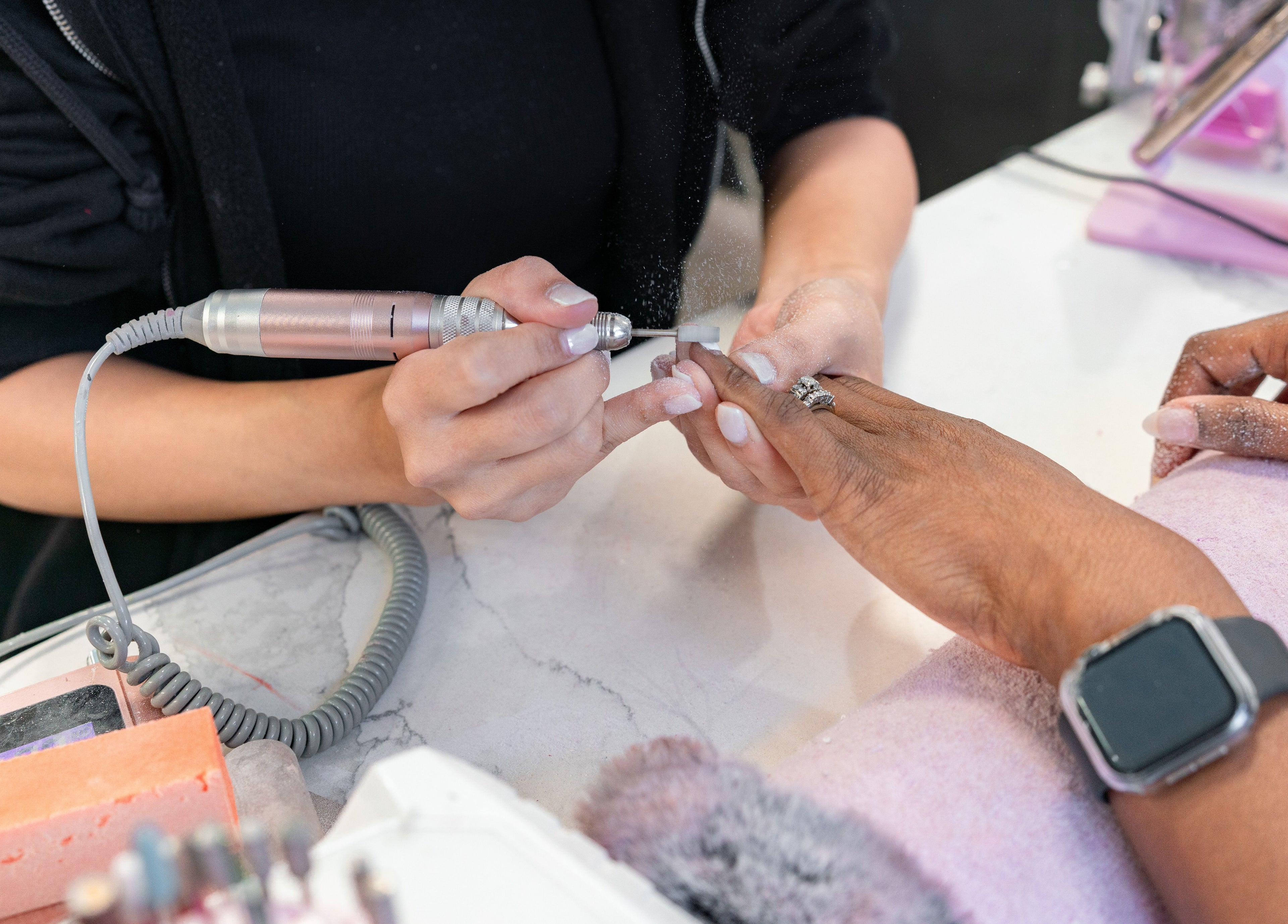 Manicure service at Angelic Nails Spa in Pembroke Pines, Florida, US, showcasing skilled nail technician.