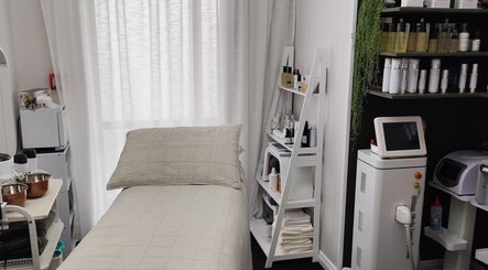 Cozy treatment room at Arise Skin and Beauty, Palmerston North, Manawatū-whanganui Region, NZ featuring skincare tools.