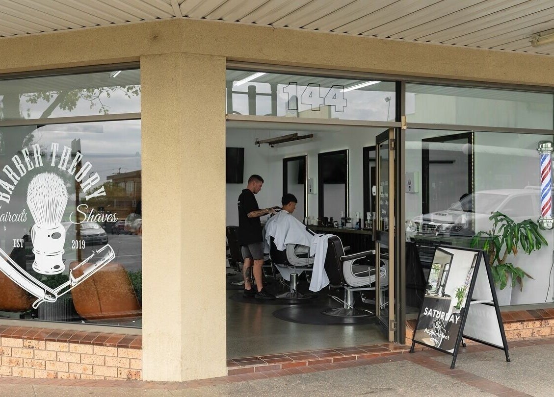 Barber Theory exterior in Nowra, New South Wales, AU, showcasing stylish barber station inside.