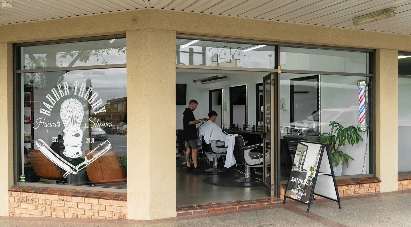Barber Theory exterior in Nowra, New South Wales, AU, showcasing stylish barber station inside.