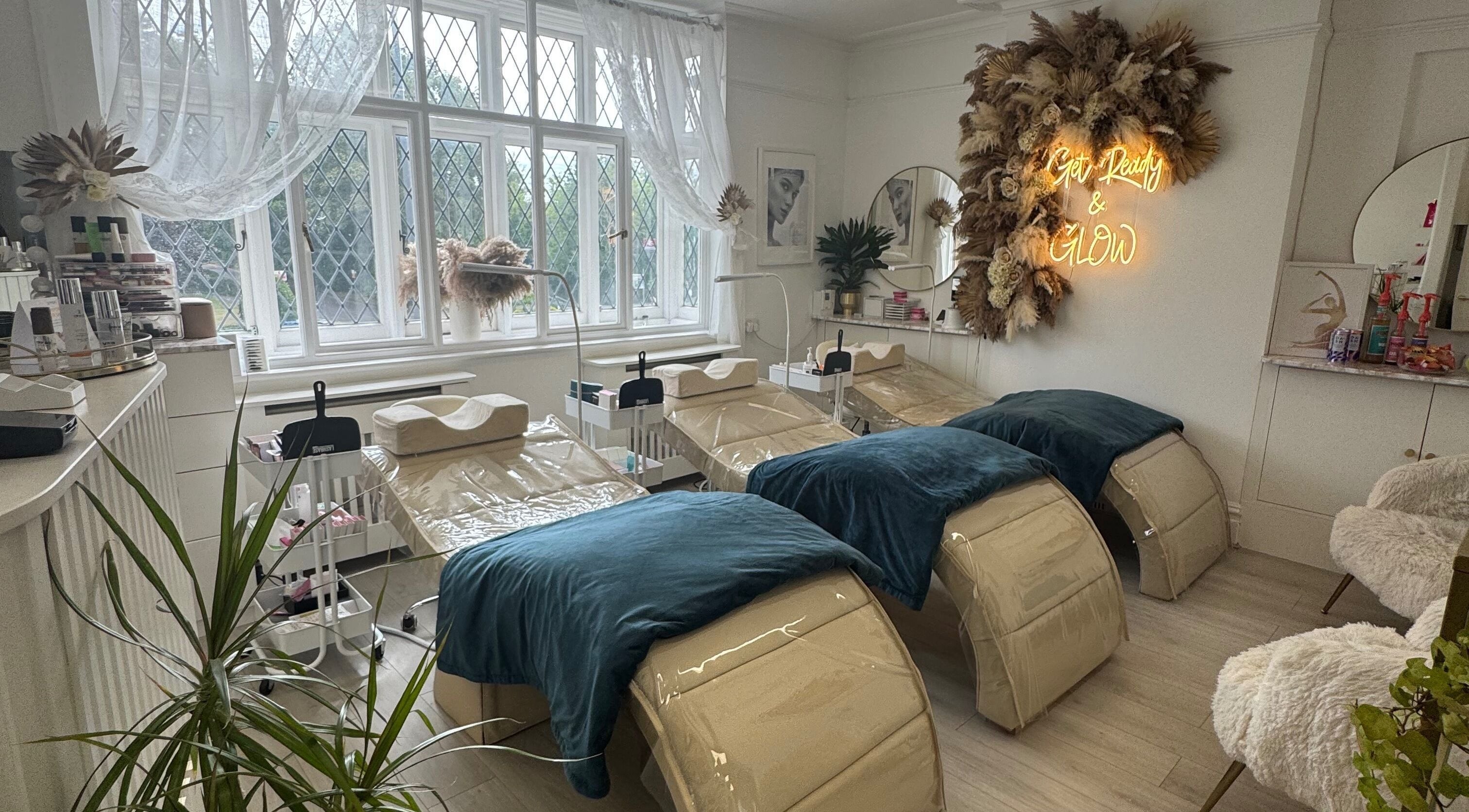 Relaxing treatment room at Glow Beauty & Skincare in Beaconsfield, England, GB, featuring plush treatment beds.
