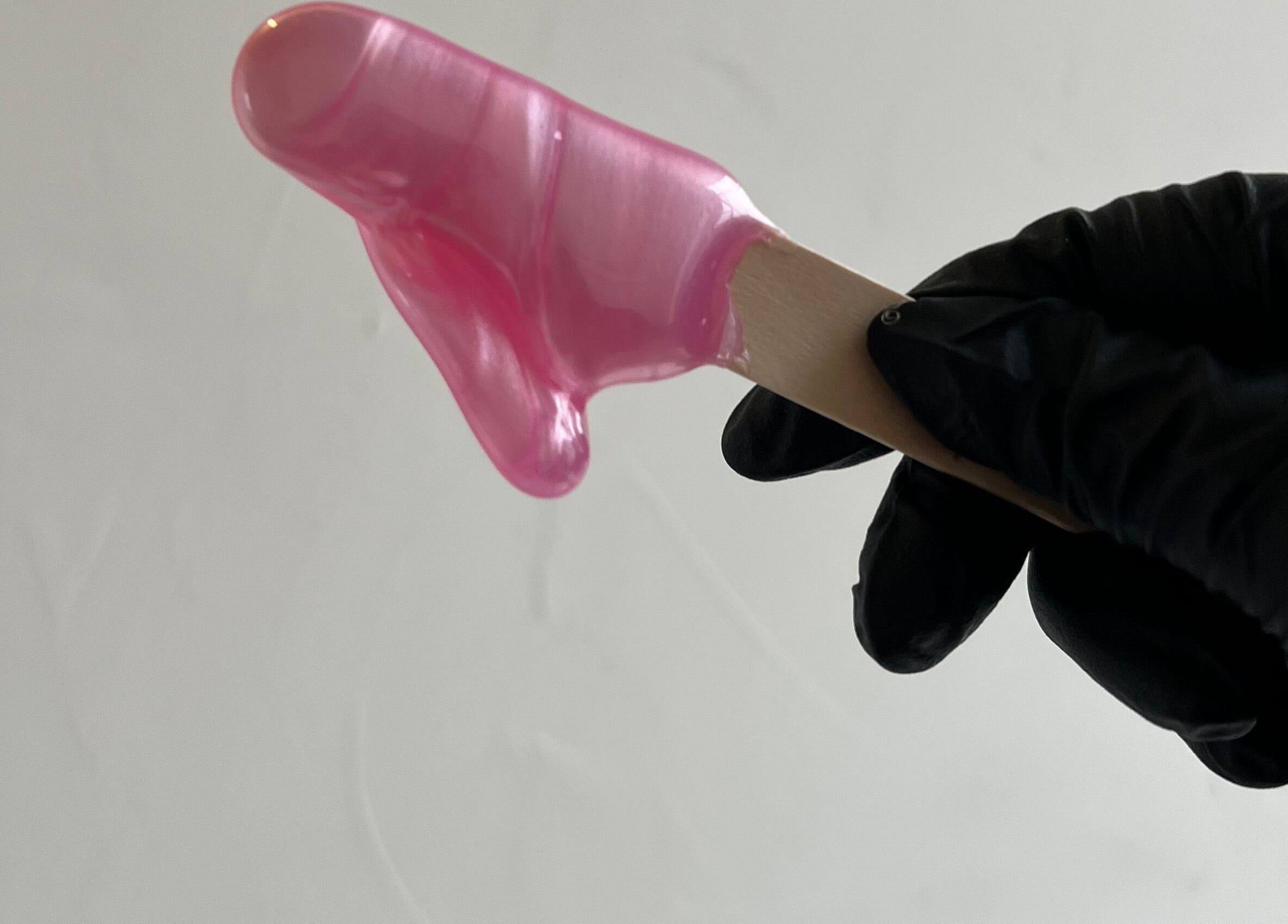 Pink gel being applied with precision at Funkd Up Nails in Montréal, Québec, CA.