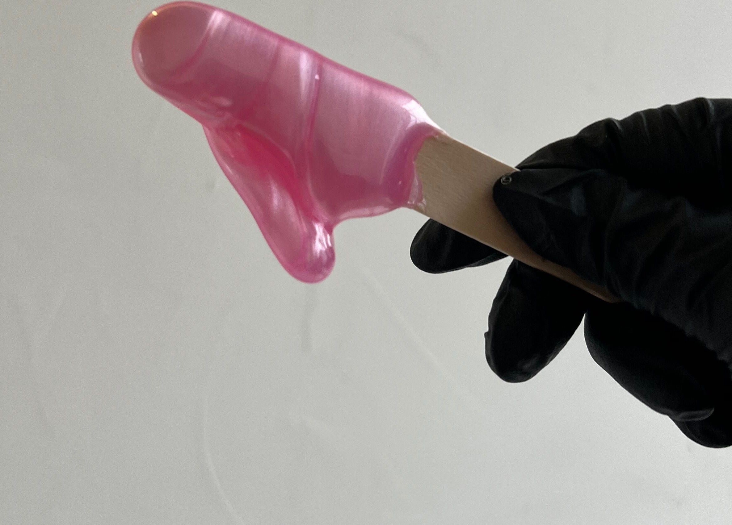 Pink gel being applied with precision at Funkd Up Nails in Montréal, Québec, CA.