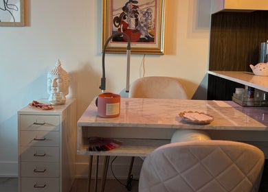 Serene nail station at Nails by Natasha, Dorval, Quebec, CA with art and Buddha decor.