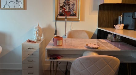 Serene nail station at Nails by Natasha, Dorval, Quebec, CA with art and Buddha decor.