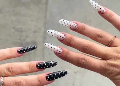 Polka dot nail design at Nails by Natasha, Dorval, Quebec, CA. Black and white elegance.