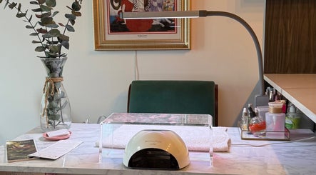 Elegant nail station at Nails By Natasha, Dorval, Quebec, CA, with tools and decor.